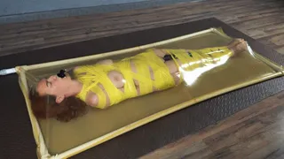 Mummification with yellow ribbons in a vacuum bed with vibration