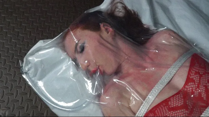 Sonia in red with bondage rope vibro in vacuum bag