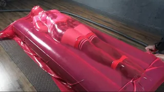 Schoolgirl flips in pink vacuum bed with mattress and bondage with red rope