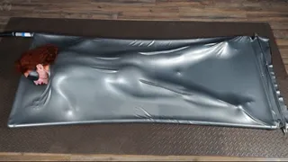 Orgasms butt up in a gray latex bed