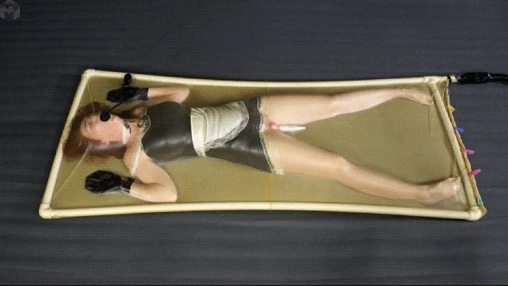 Sonya the maid in a latex vacuum bed