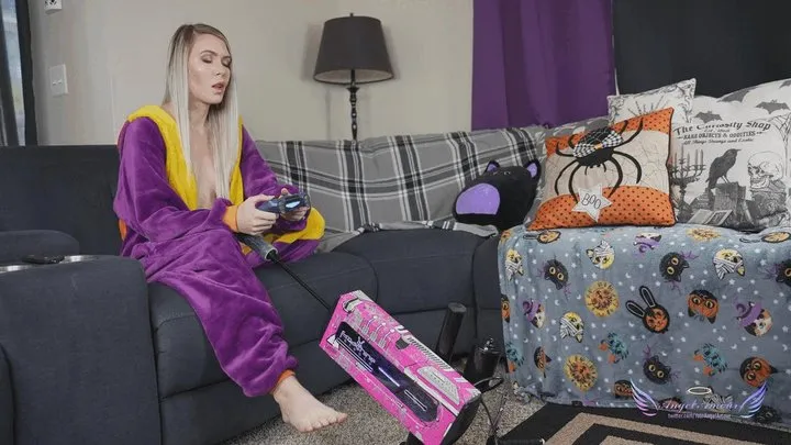 Playing video games while getting fucked by a machine