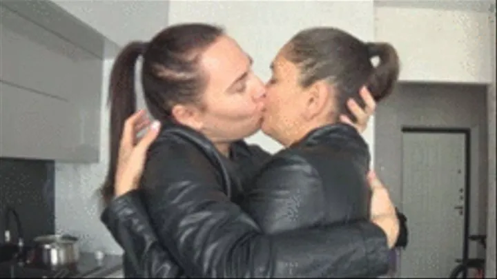 Lesbians sexy kiss and hug in leathers 2