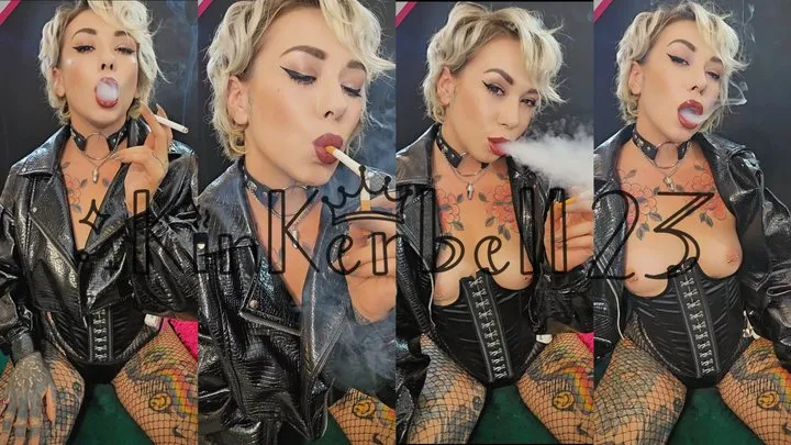 Chain-smoking two Newport cigarettes wearing shiny outfit and fishnets - Kinkerbell23