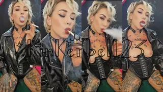 Chain-smoking two Newport cigarettes wearing shiny outfit and fishnets - Kinkerbell23