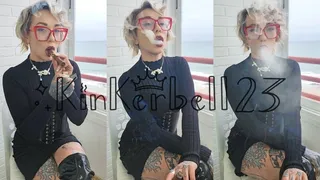 Enjoying cigar wearing glasses, tight dress and boots - Kinkerbell23