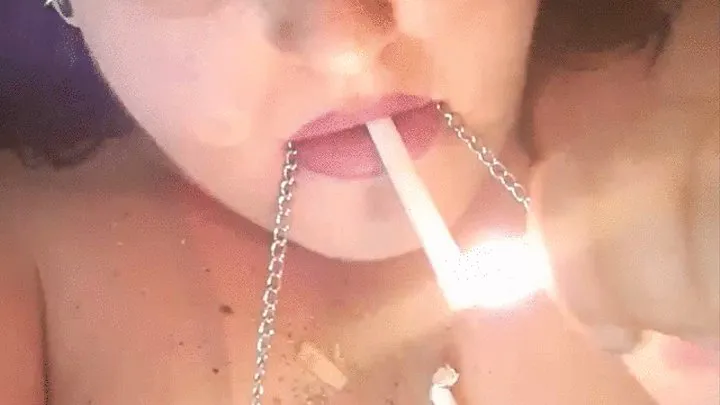 Filthy bbw Smoking with nipple clamps on, covered in ashes and cigarette butts