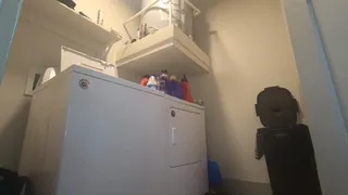 gassy black man farts while doing laundry