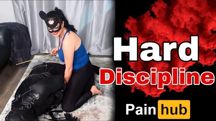 Hard Discipline - Ballbusting, Spanking, Caning in Straight Jacket