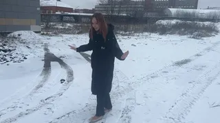 The girl went out for a walk in ballet flats in winter and did not expect that they would slide so much on ice and snow