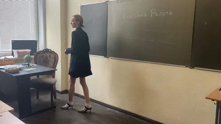 teacher is teaching a class and accidentally trips and sprains her ankle, but she still has to teach the class with a bad leg (re-release)