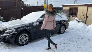 girl tries to start the car, but nothing works