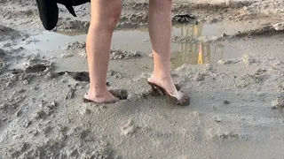 video compilation of the best moments with a girl walking through the mud in high heels