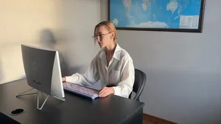 accountant at work plays with shoes and dreams of someone giving her a foot massage