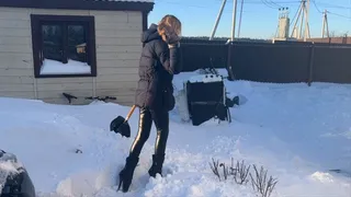 girl in ballet boots climbs a snowy mountain and falls off it many times