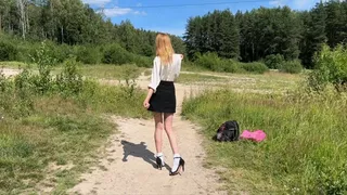 Girl in high heeled sandals and snow-white socks walk on mud and change her dirty socks on white 3 times