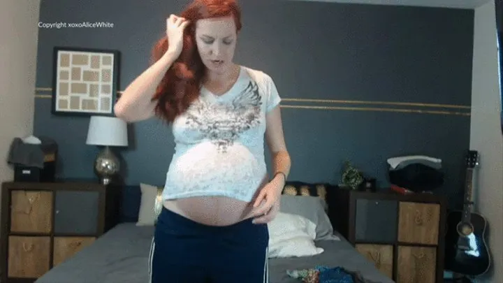 Pregnant Alice tries on tops