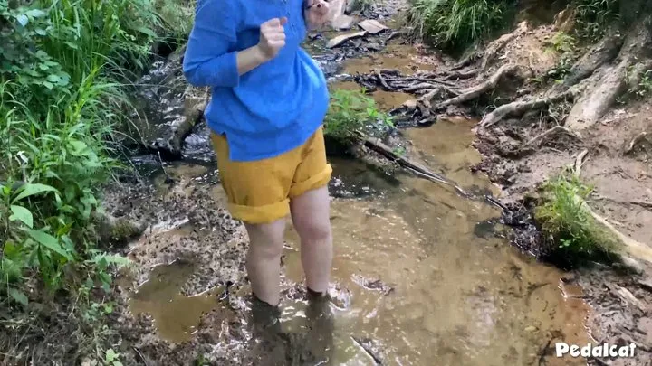 Barefoot in the mud, heels getting stuck in the mud, puddle splashing