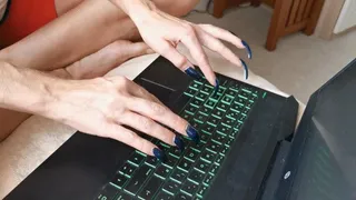 Long talons typing keyboard
