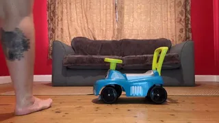 Giantess Riding On A Ride-On Toy Car