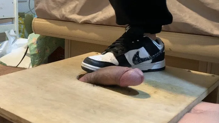 My girlfriend Tina trampling cock with black nike dunk low sneaker on cock box(cum)