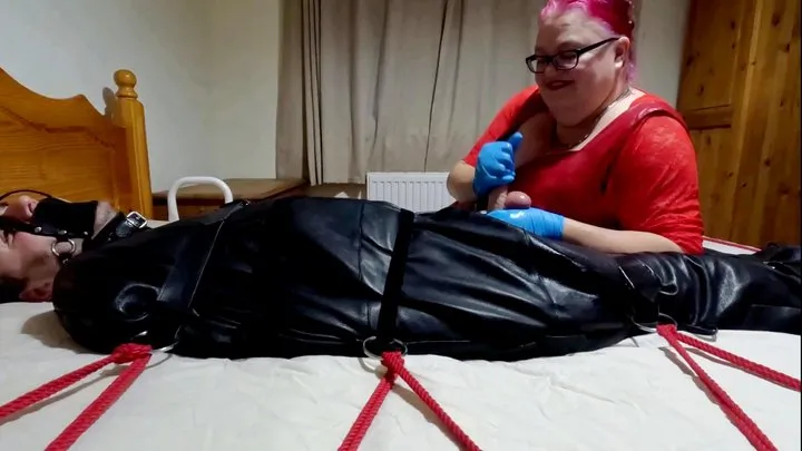 Full video of Miss M slow edging, post orgasm and polishing in leather sleepsack