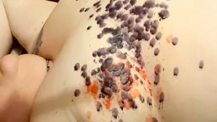 Miss M has hot wax dropped on her tits as she is made to cum