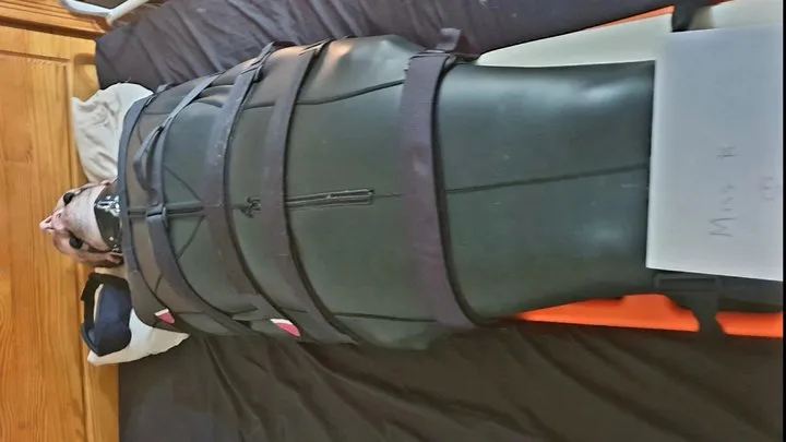 Miss M leaves helpless man bound in neoprene bondage sack