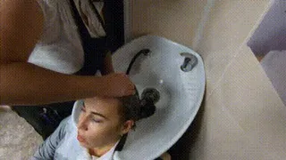 Hair washing in salon in leather pants