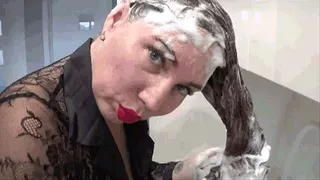 Hair washing in kitchen sink