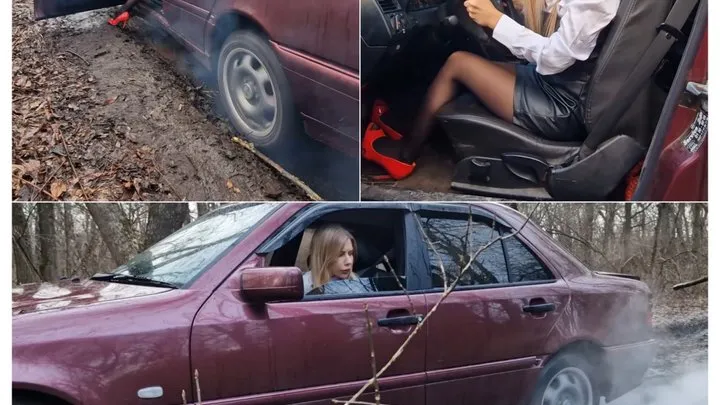 Lucy is lost and desperately trying to get out of the mud in an old Mercedes