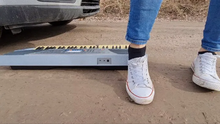 Music keyboard crushing by car