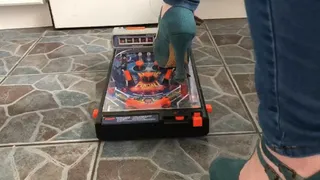 Pinball machine destroyed by high heels