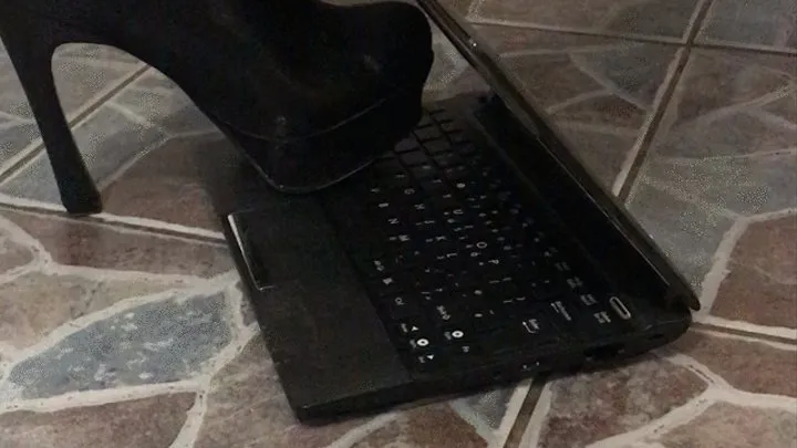 Metal tip heels destroy laptop