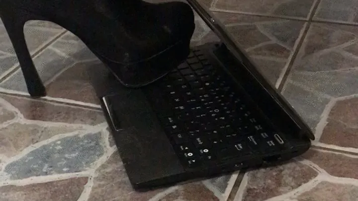 Metal tip heels destroy laptop after long day at work