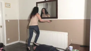 Stepping On Her Slave In High Heels Whilst Brushing Her Hair