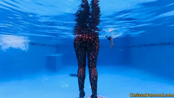 Carissa in the cougar catsuit underwater with scooter addition