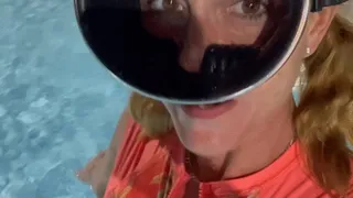 Carissa playing underwater with an oval mask