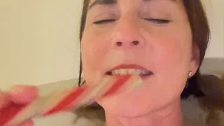 Candy cane in the bathtub; an oral fetish display!