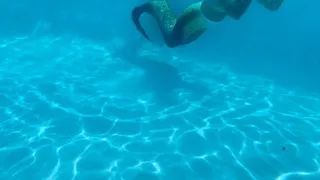 Mermaiding at the resort with bonus footage of bikini strip down