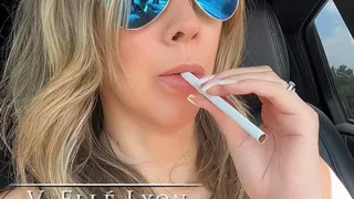 Elle Lyon Takes a Smoke Break in Her Car