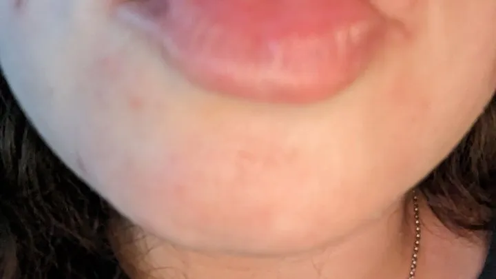 Showing off my uvula with wet glossy lips