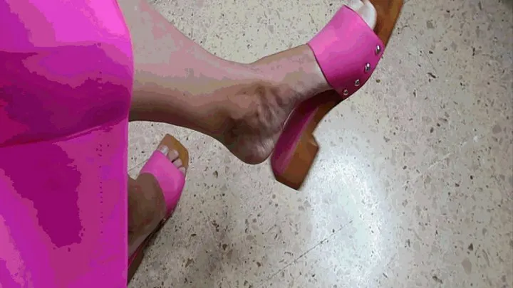 Dangling in pink flip flops