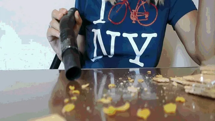 Cleaning the table with a vacuum cleaner