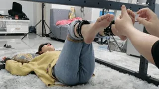 Asian Bondage 101 - Cute girl barefoot chained to the floor tickling feet