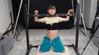 Chinese Bondage 105 - Cute Chinese girl is tied to a steel frame and uses a vibrator to play with her boobs