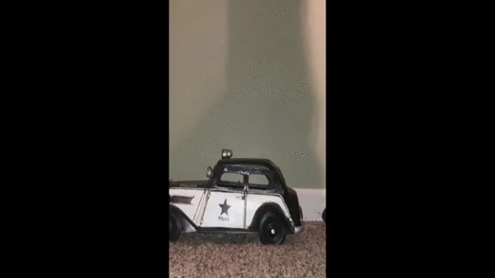 Model car stomped with cleats