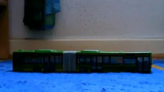 Boy crushes toy bus