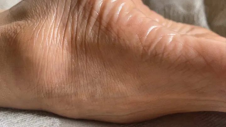 Milah Arches extreme close up foot soles