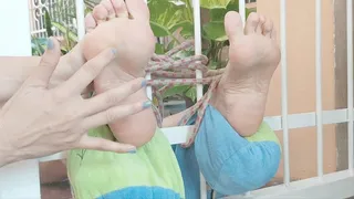 Milah Arches Foot Tickling in the window